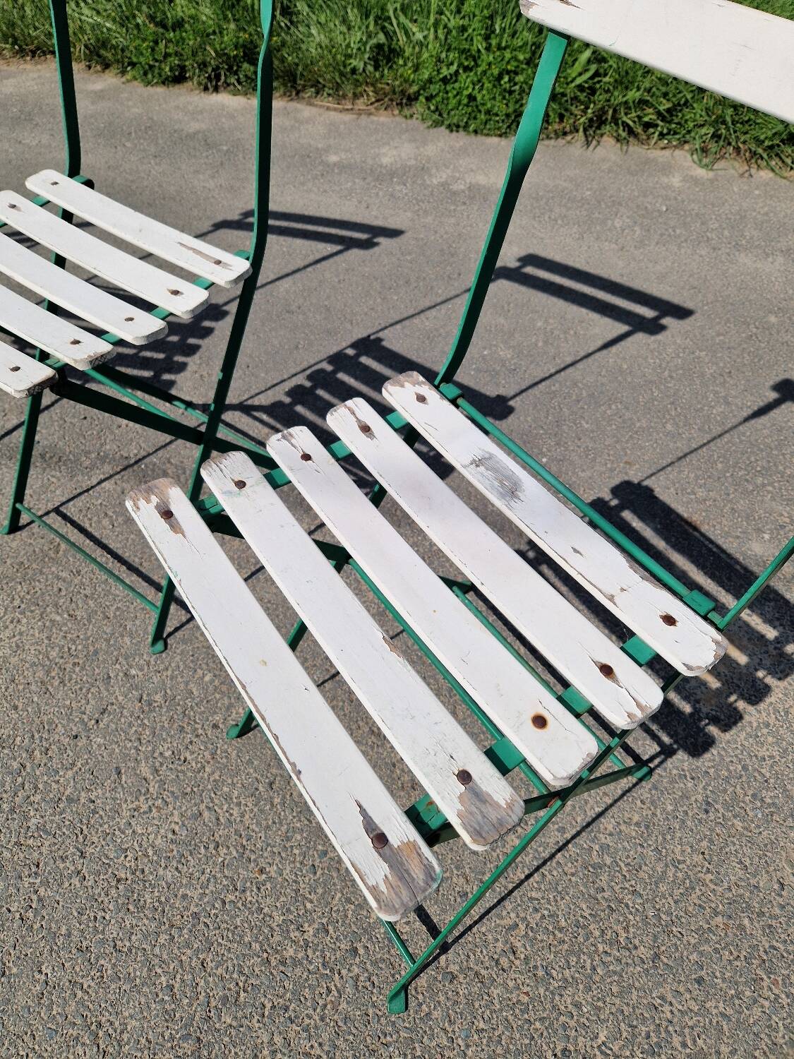 Set of 4 folding wrought iron bistro chairs