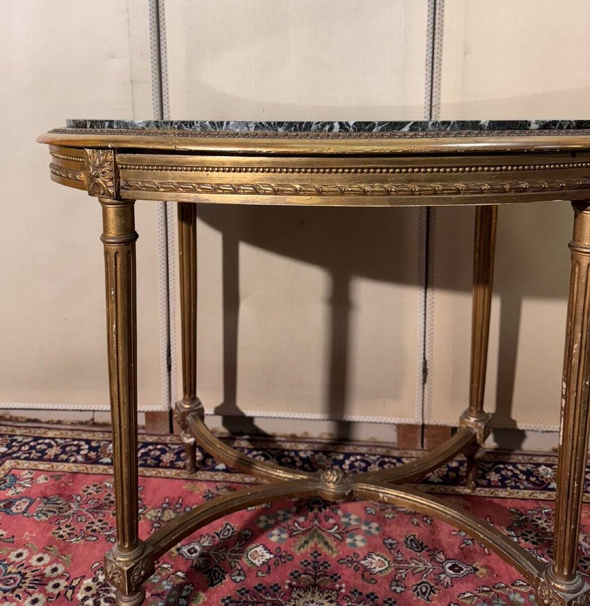 Louis XVI style pedestal table in gilded wood