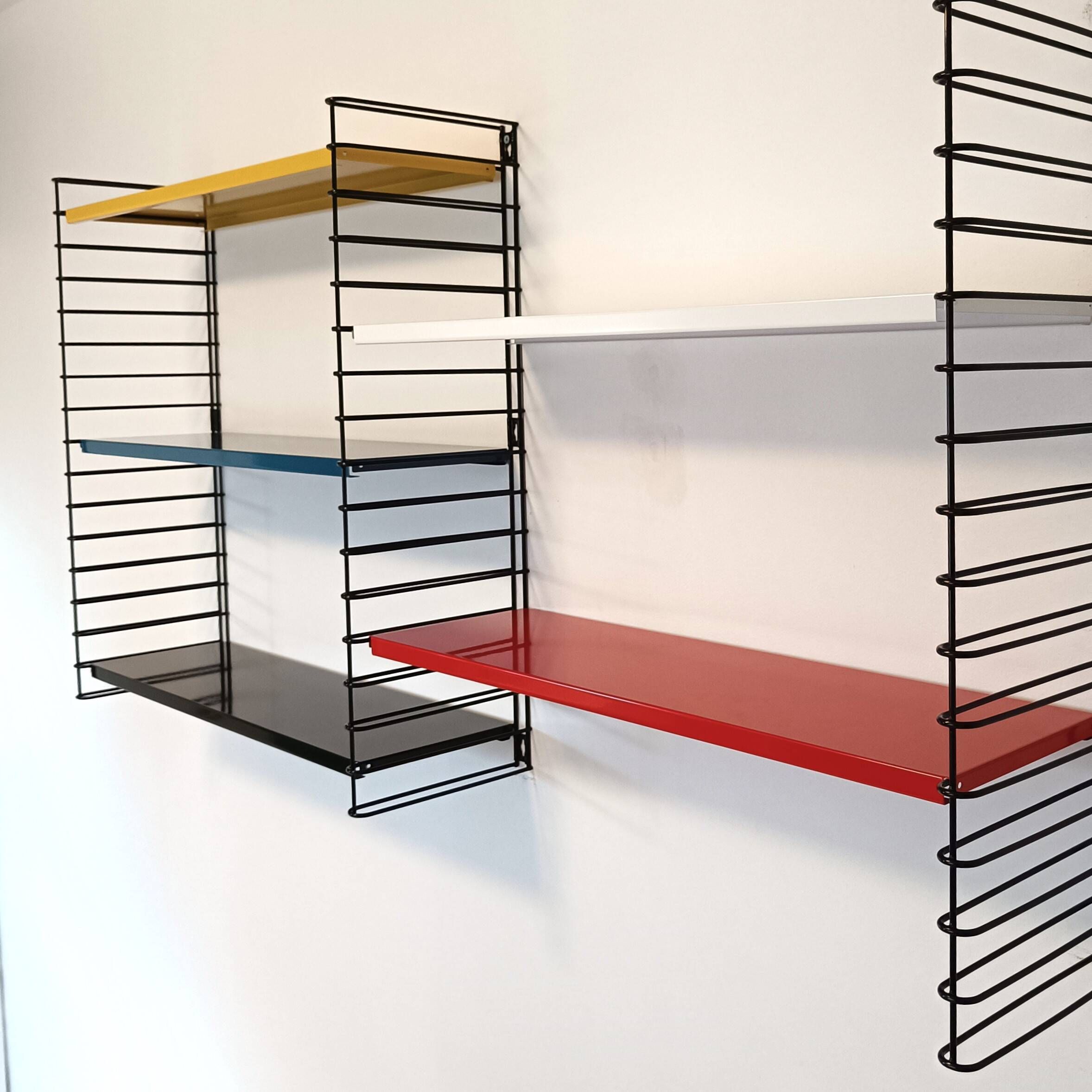 Tomado wall unit with metal shelves by A. Dekker