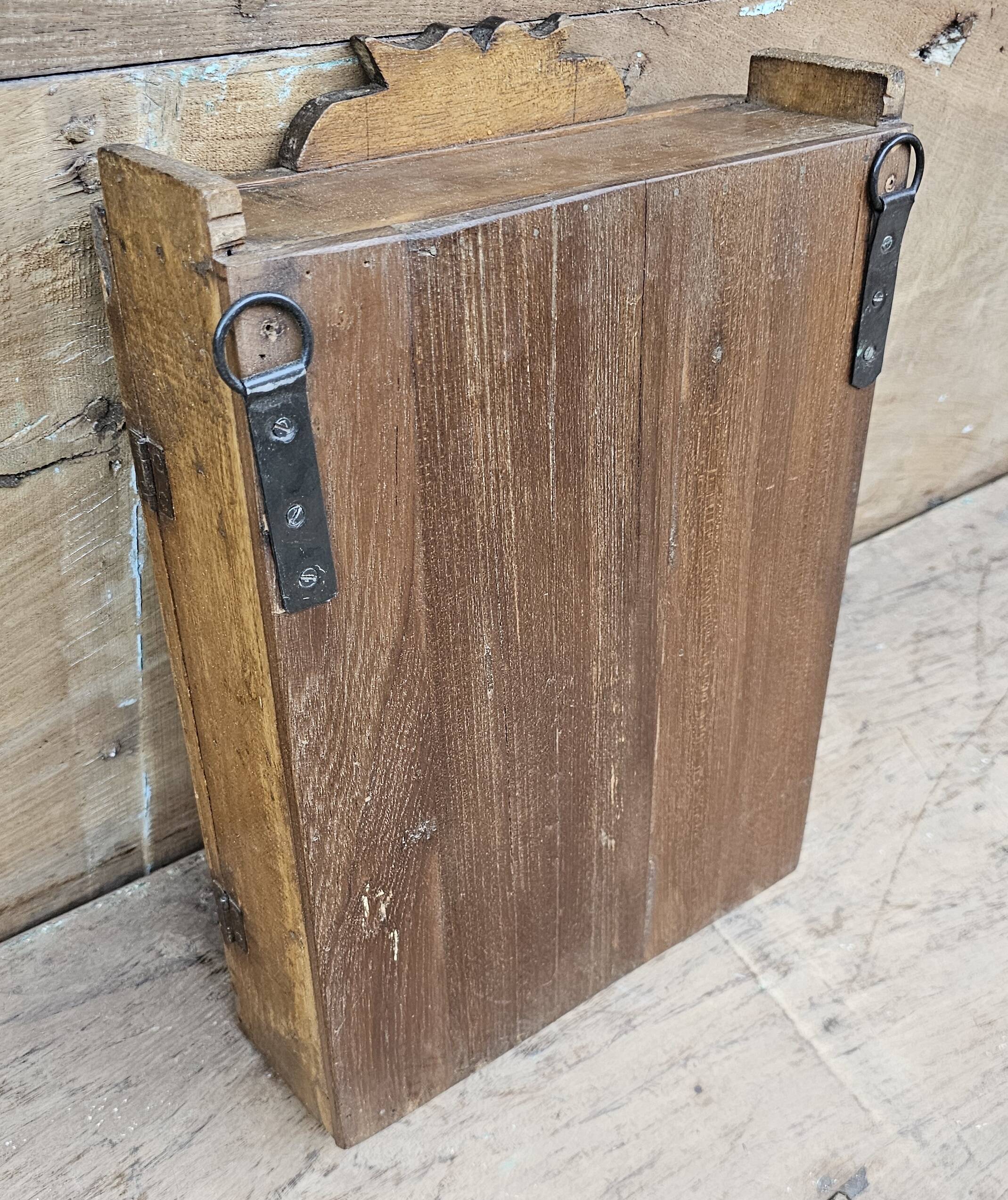 Old tribal wall display case in Burmese teak