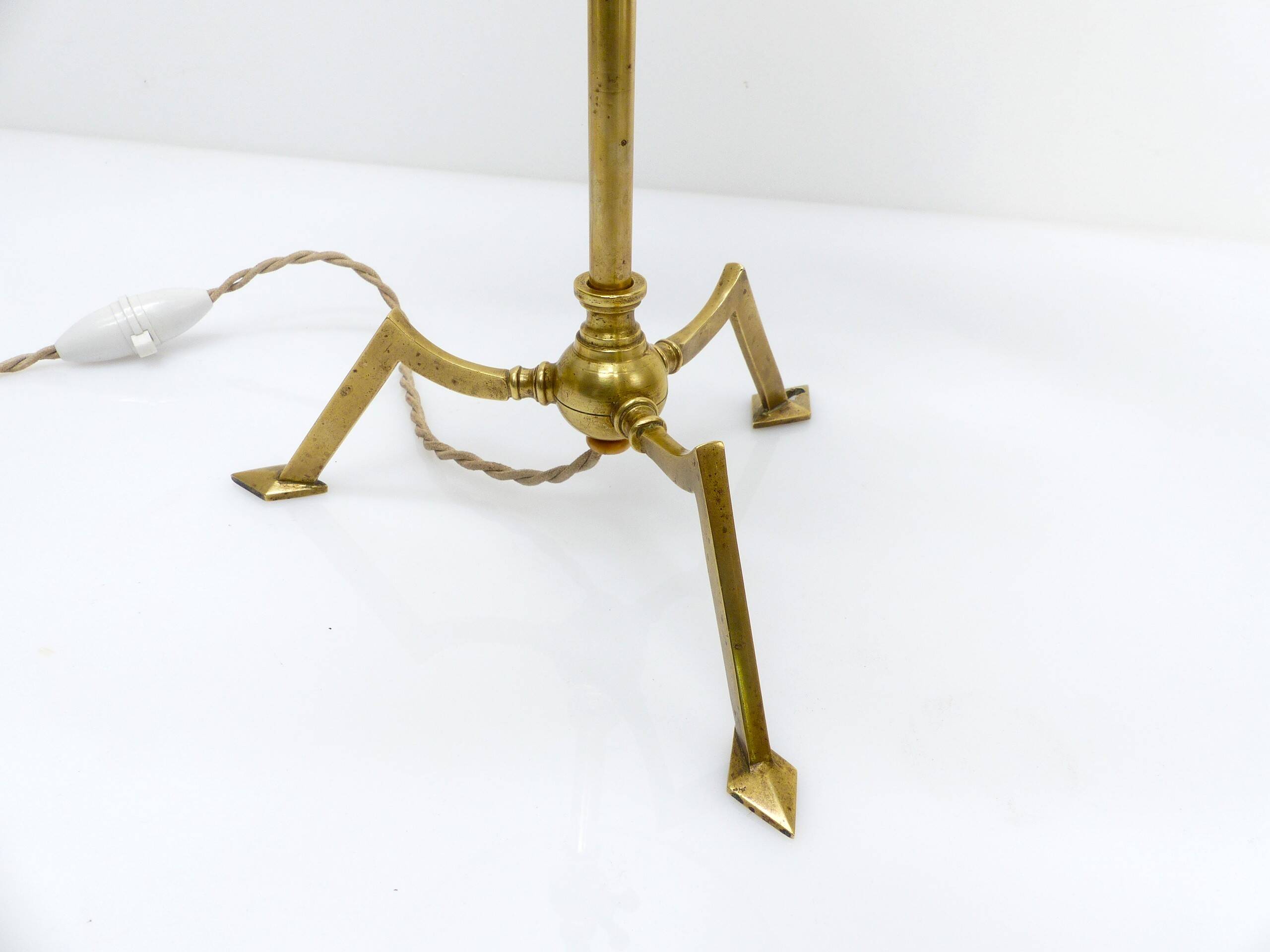 Articulated tripod lamp base in brass, Arts & Crafts style, in the manner of.