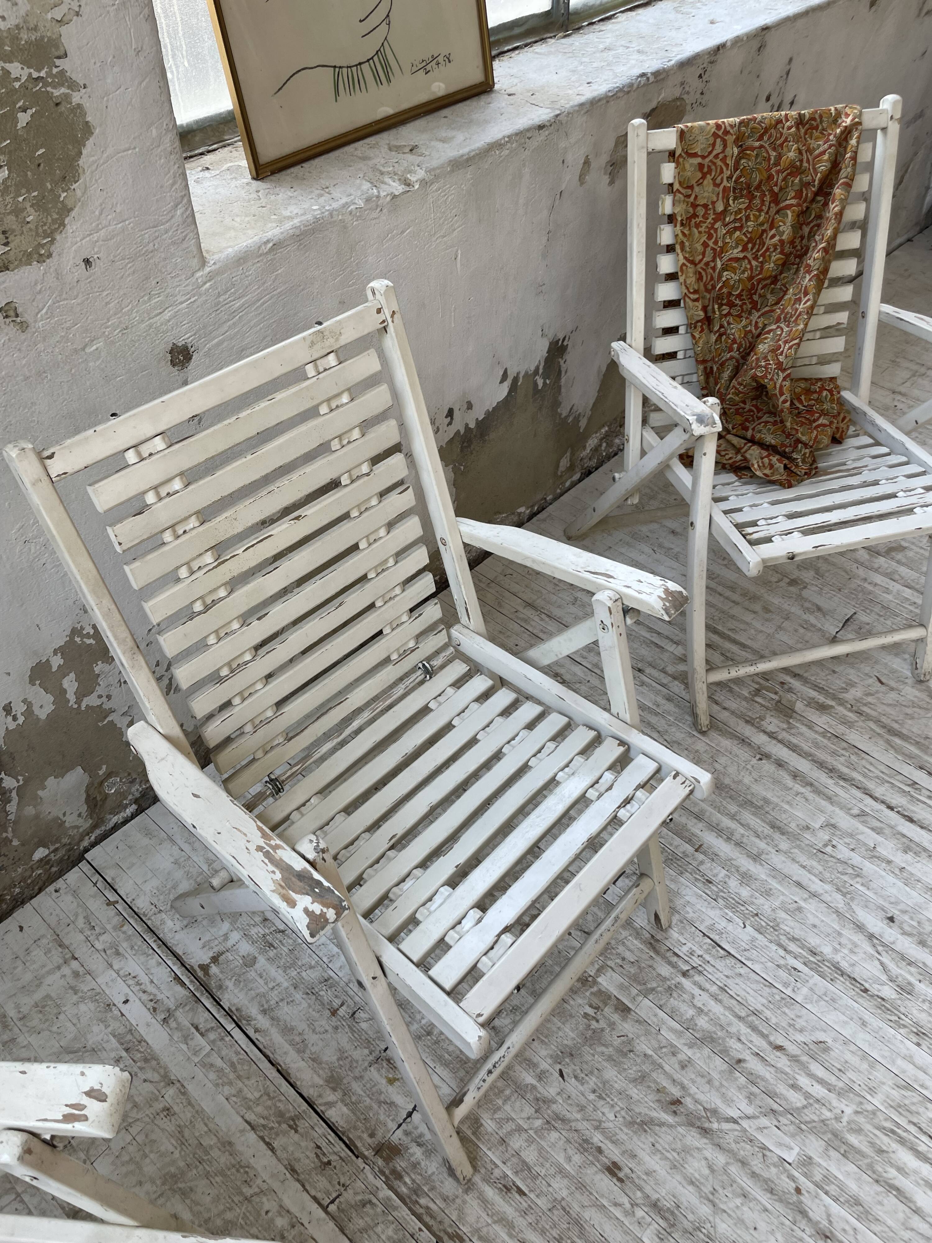 4 white wooden garden chairs