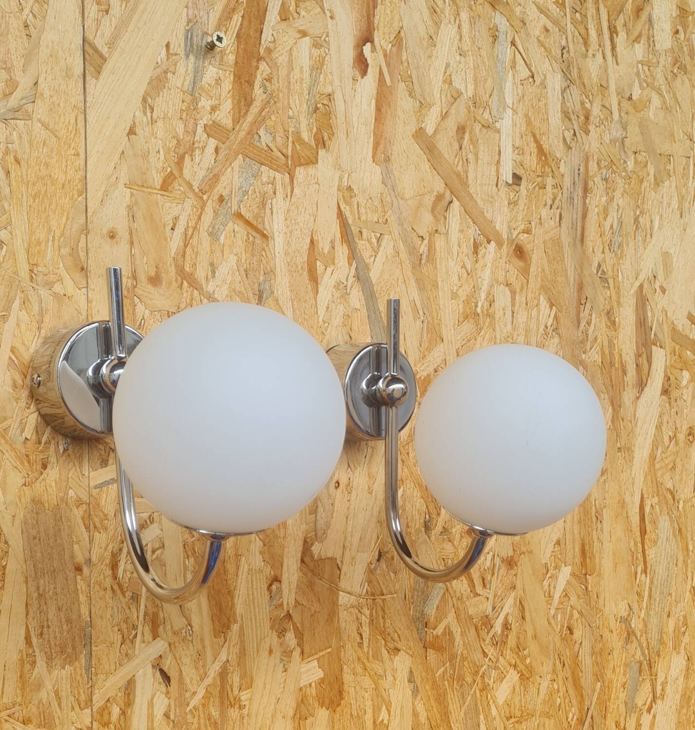 Pair of ball and chrome wall lights