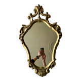 Large golden baroque style mirror