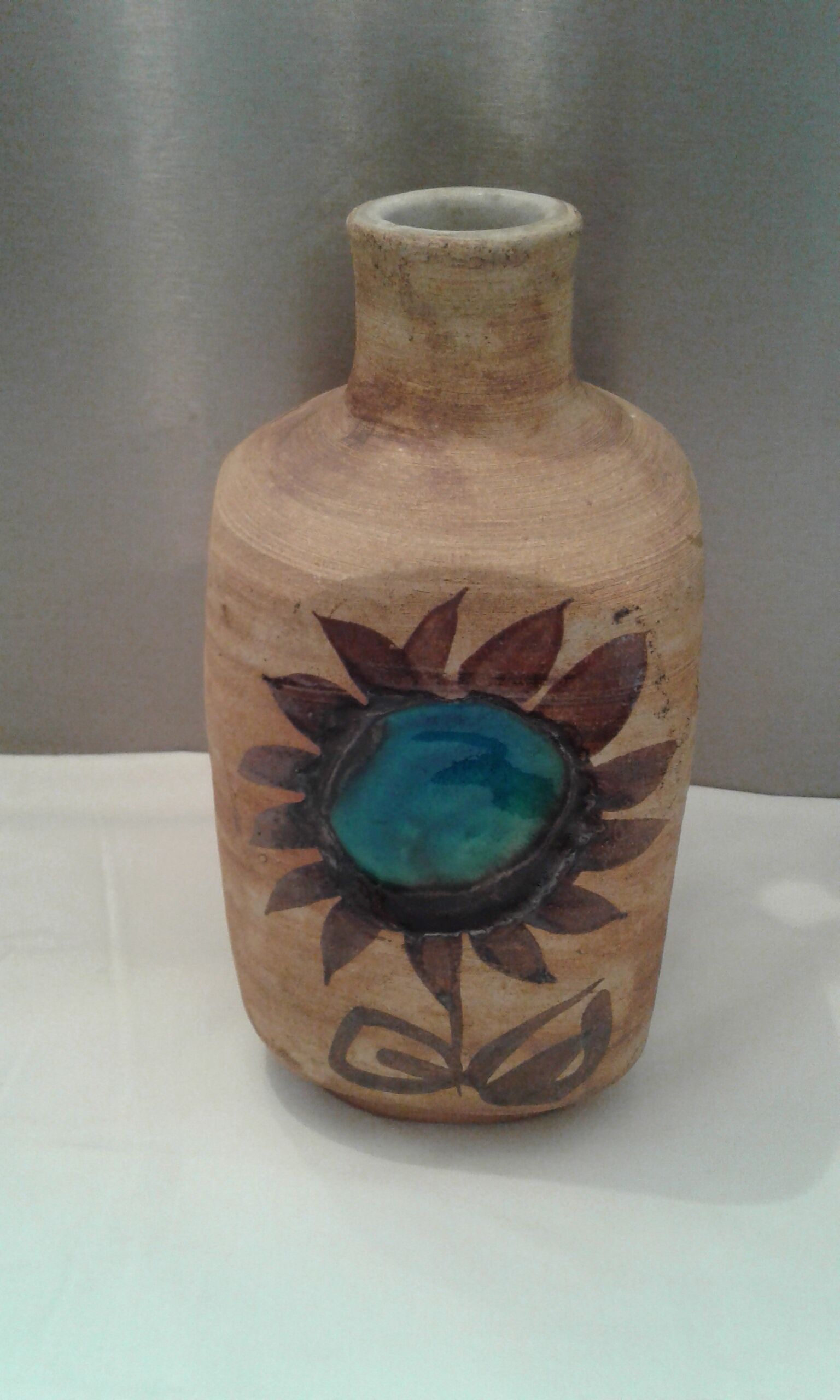Bottle vase. ceramic enamelled with a flower. Mid-20th. Ht 21.5 cm