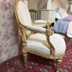 Large cabriolet armchair in Louis XVI style with gilded wood.