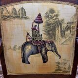 Pair of 19th-century armchairs with a scrolled back