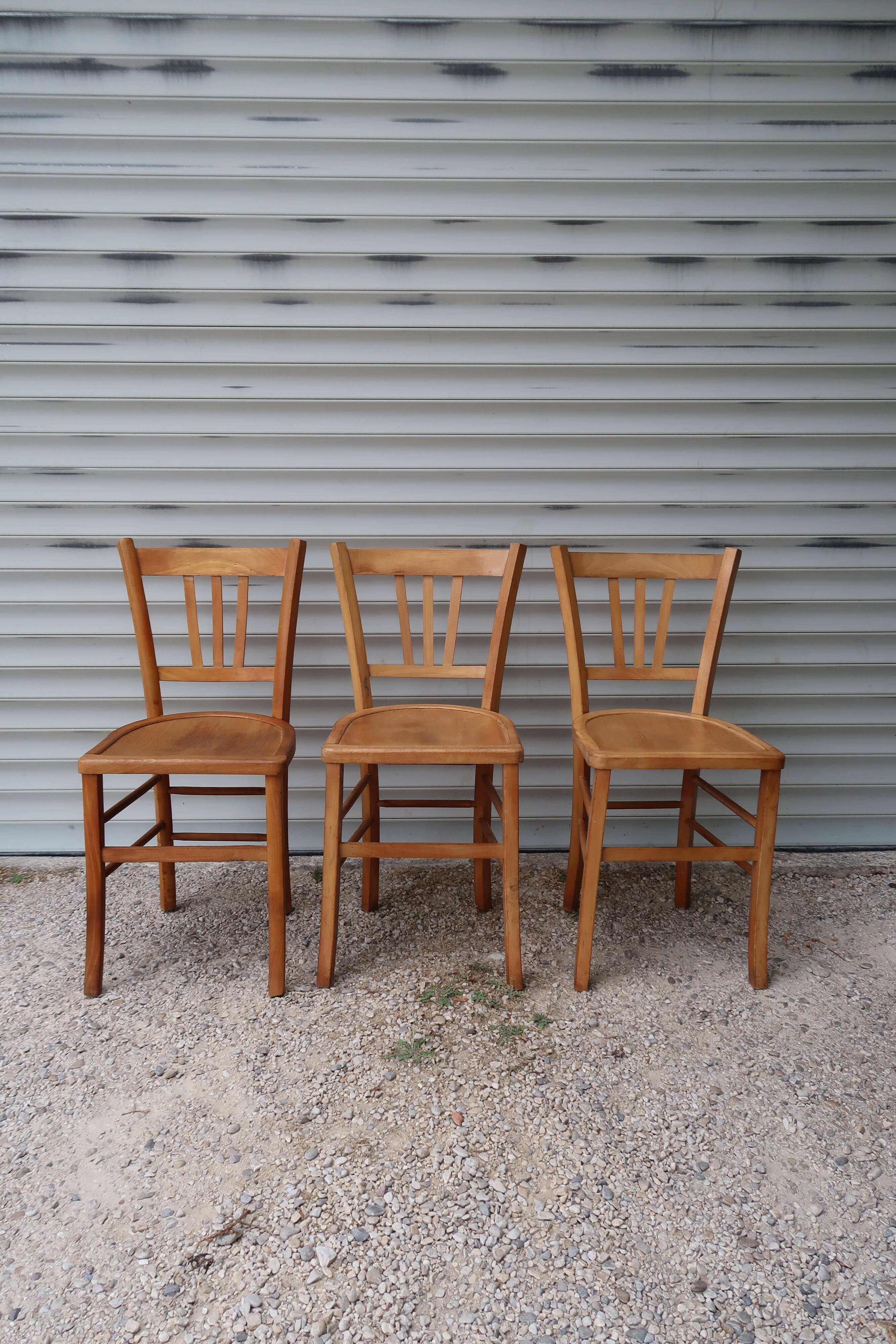 Set of 7 mismatched bistro chairs