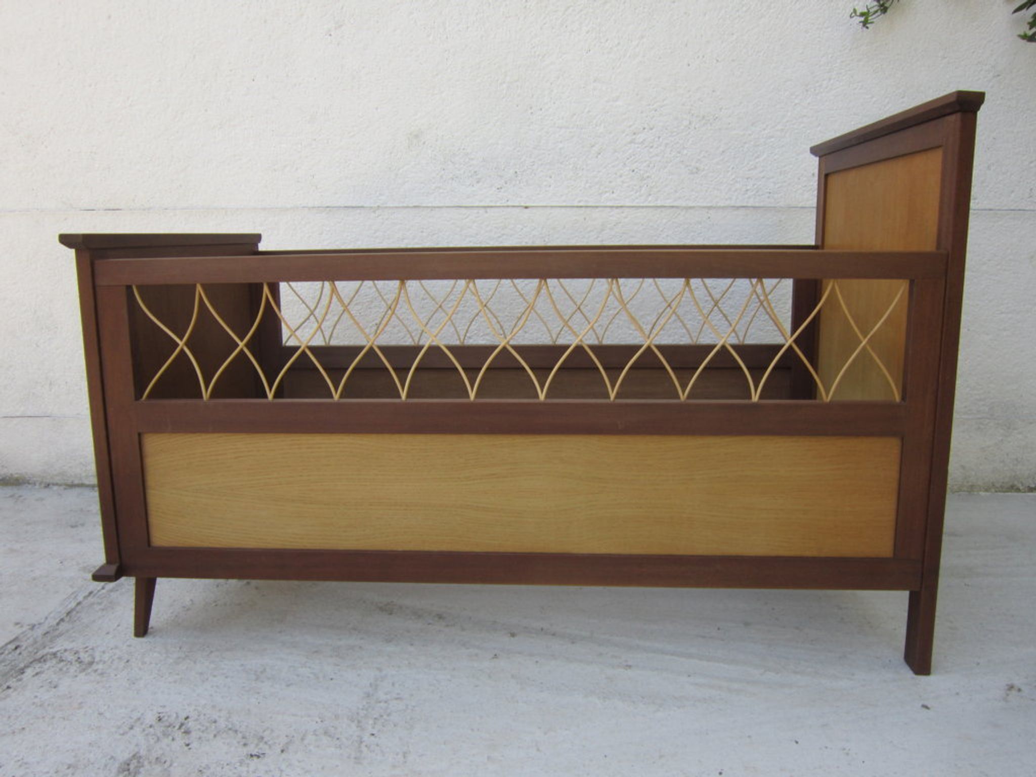 Wood and rattan child bed