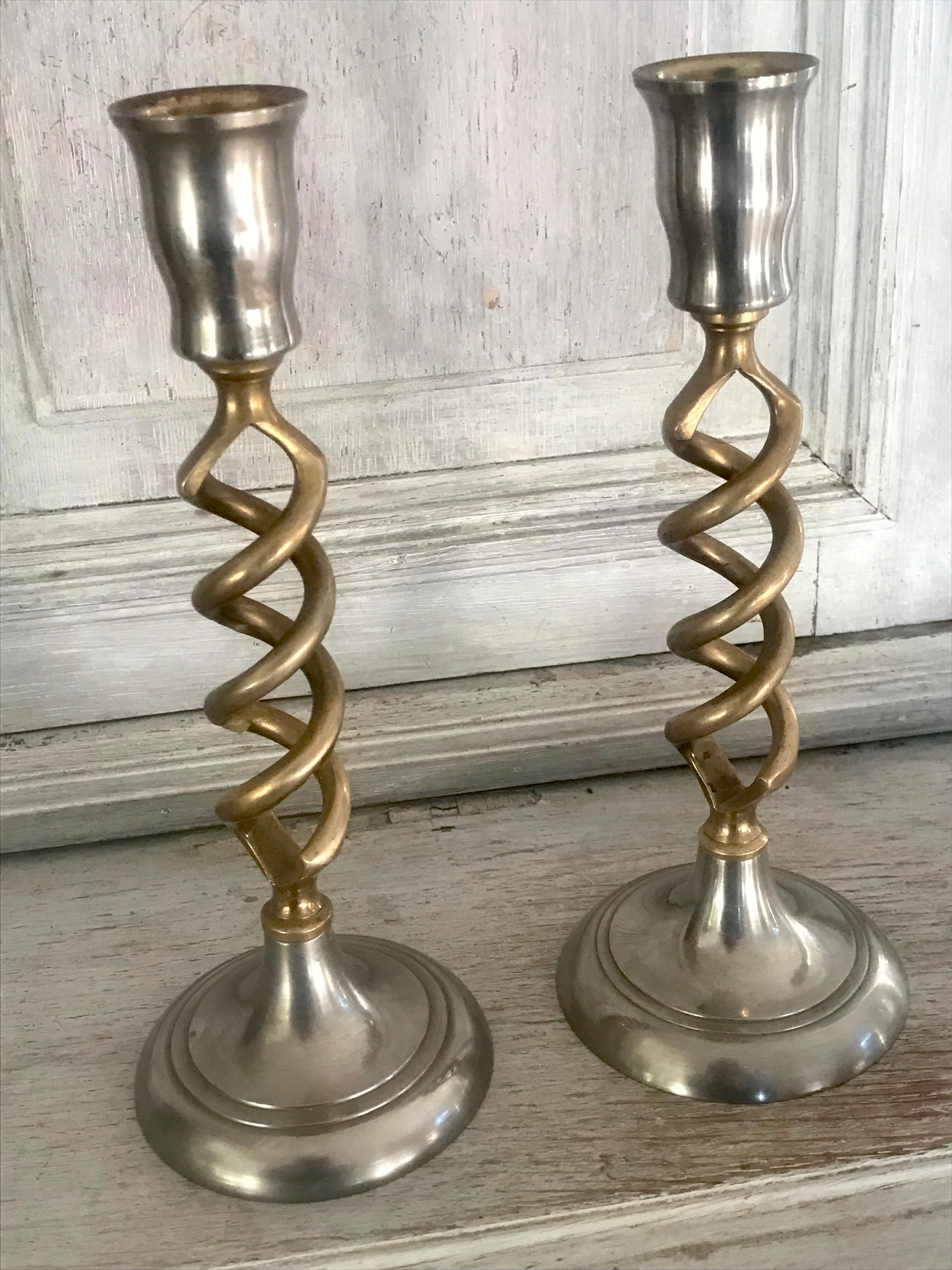 Pair of twisted brass candle holders