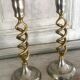 Pair of twisted brass candle holders