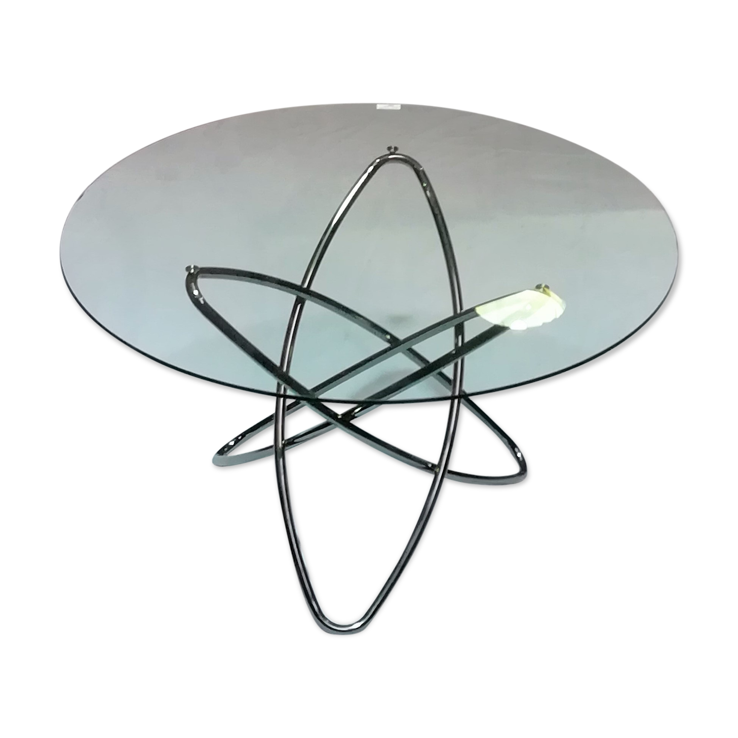 Round table in chrome and glass