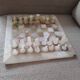 Chess set in onyx and marble