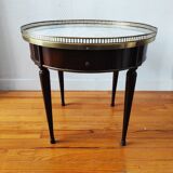 Mid 20th century hot water bottle table