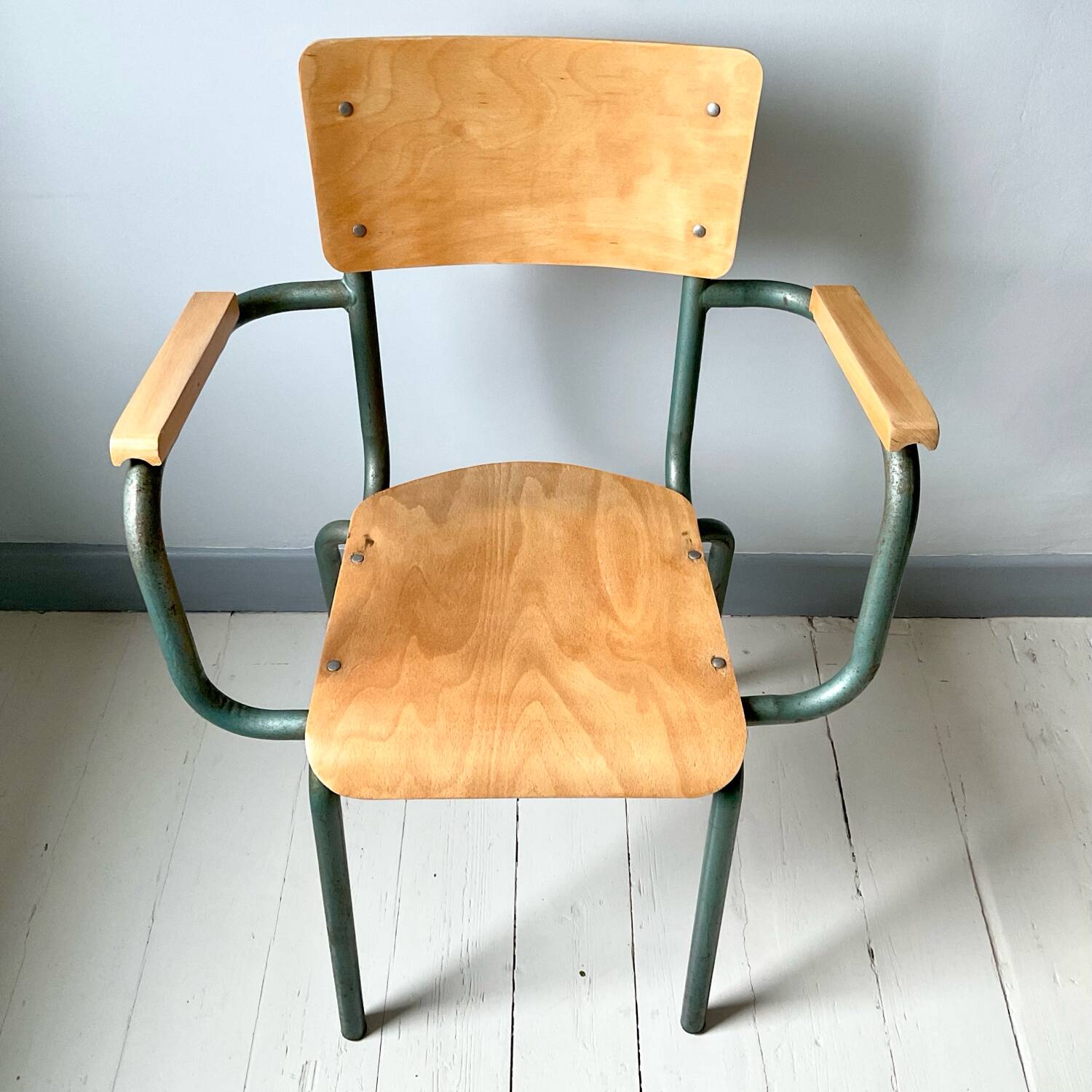 Set of four school teacher armchairs