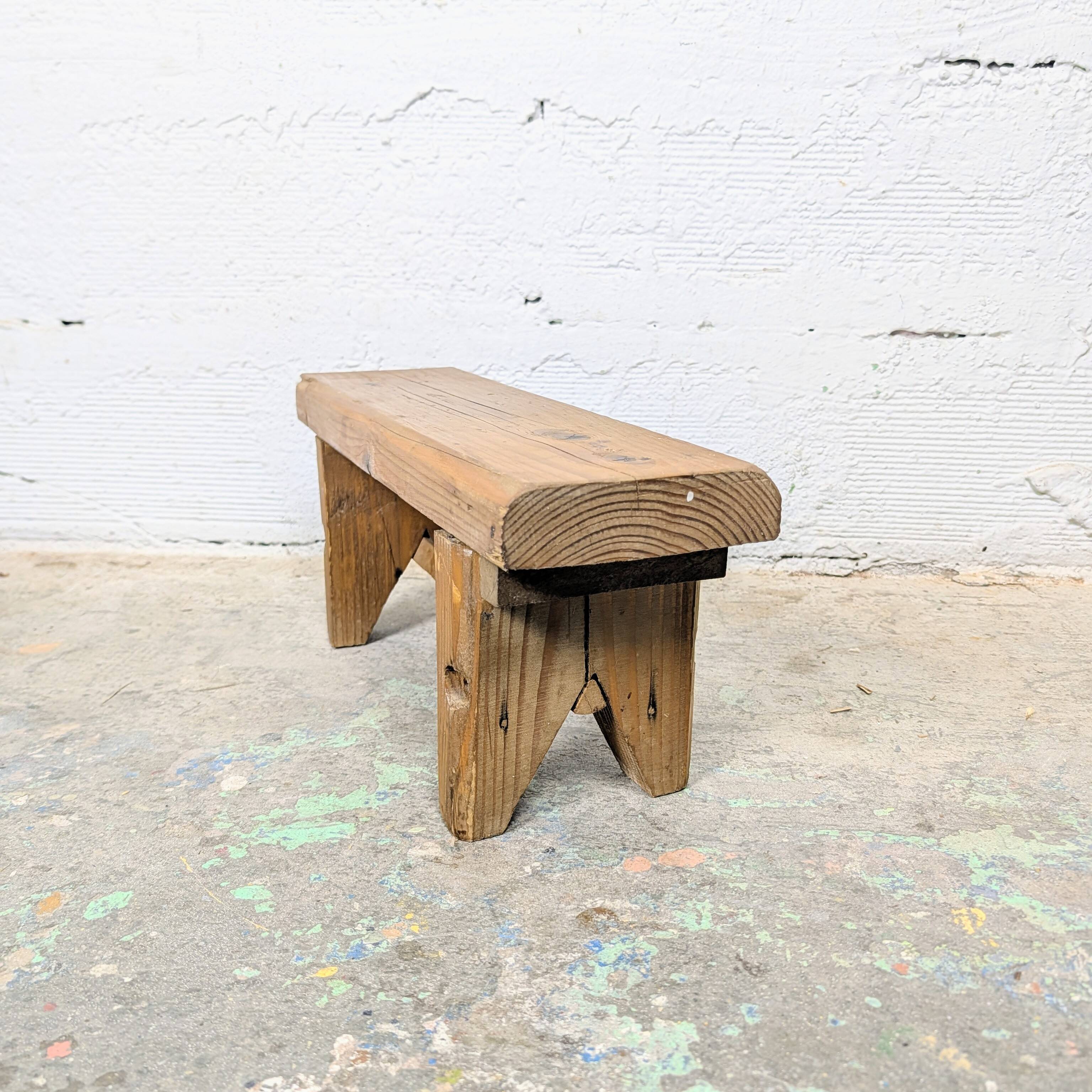 Small rustic footrest bench