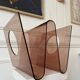 Plexiglas magazine rack by Michel Dumas for Rochebobois