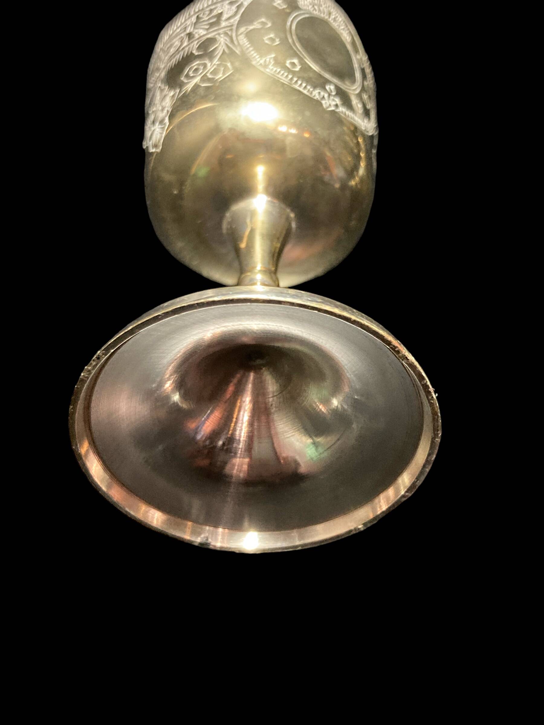 Set of six gold metal glasses