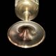 Set of six gold metal glasses