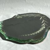 Bevelled mirror engraved under vase or bottle