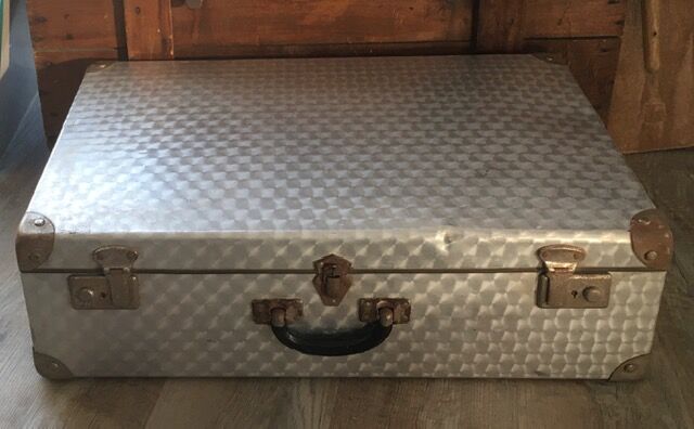 Large vintage suitcase in light metal