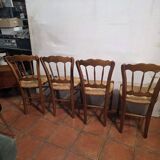 4 rustic farmhouse chairs made of wood and straw