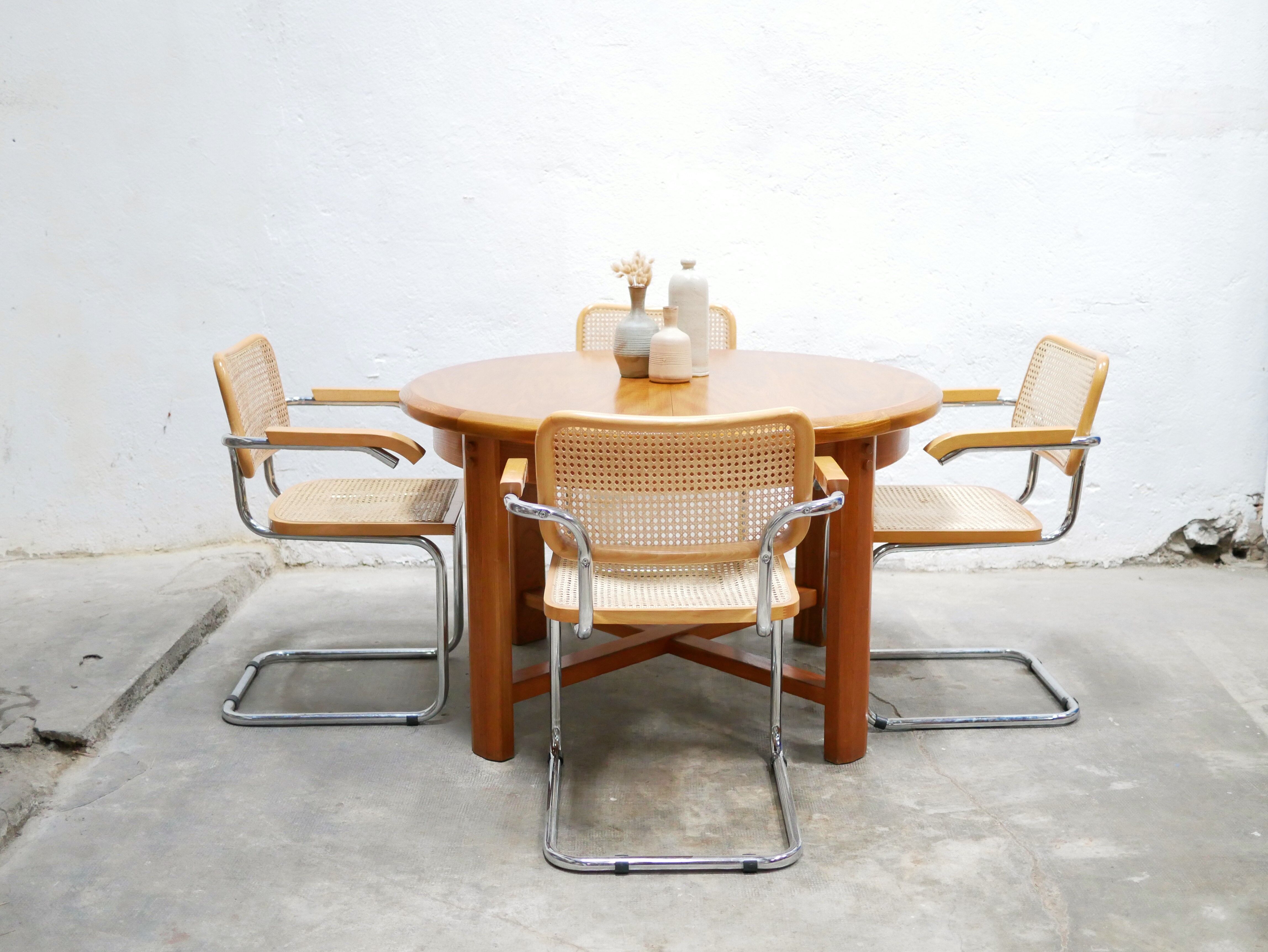 Vintage extendable round wooden dining table