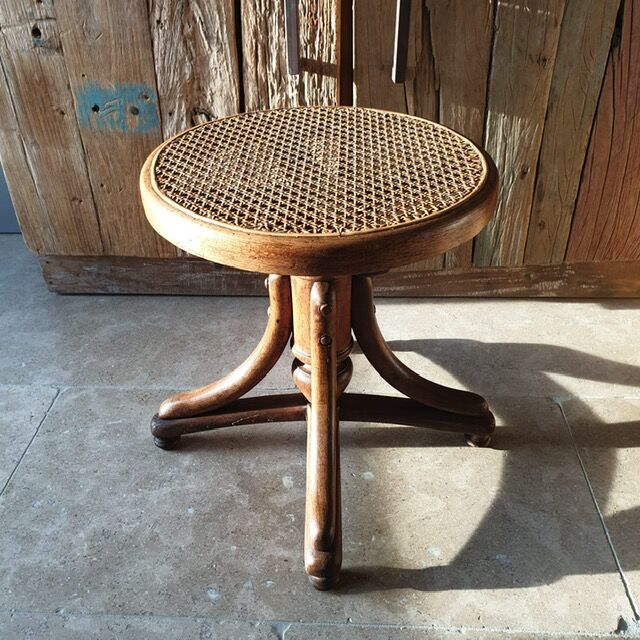 Curved wooden piano stool