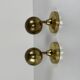 Pair of Guzzini brass spherical wall lights, 1970