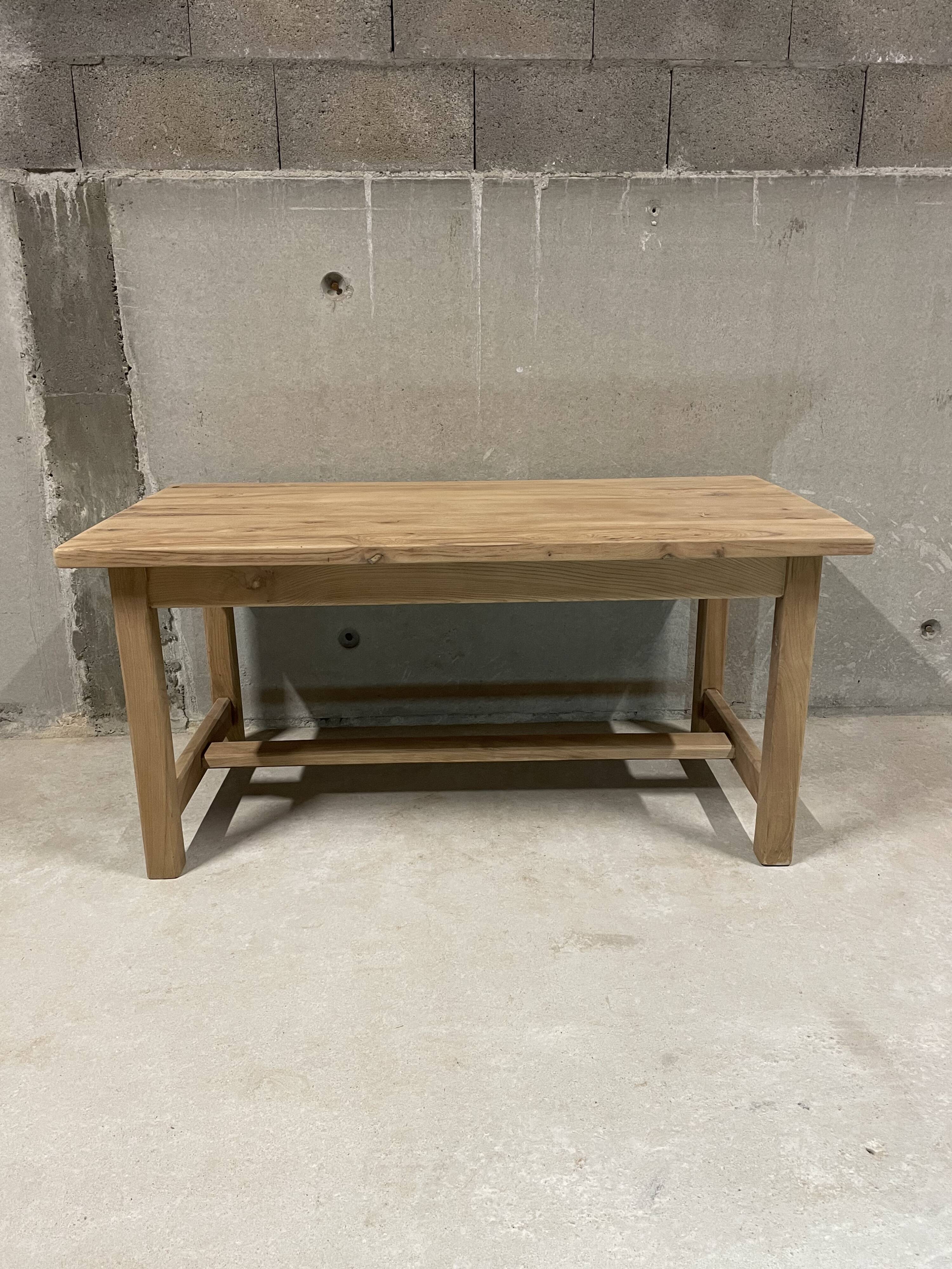 Solid wood table with beautiful natural grains.