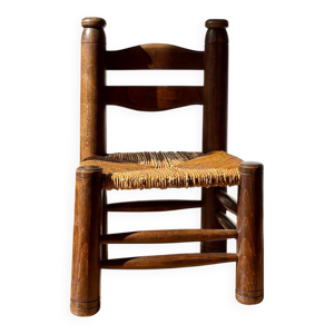 Chaise basse de cheminée