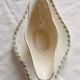 Antique sauce boat, ironstone, ivory with green floral and butterfly decoration.