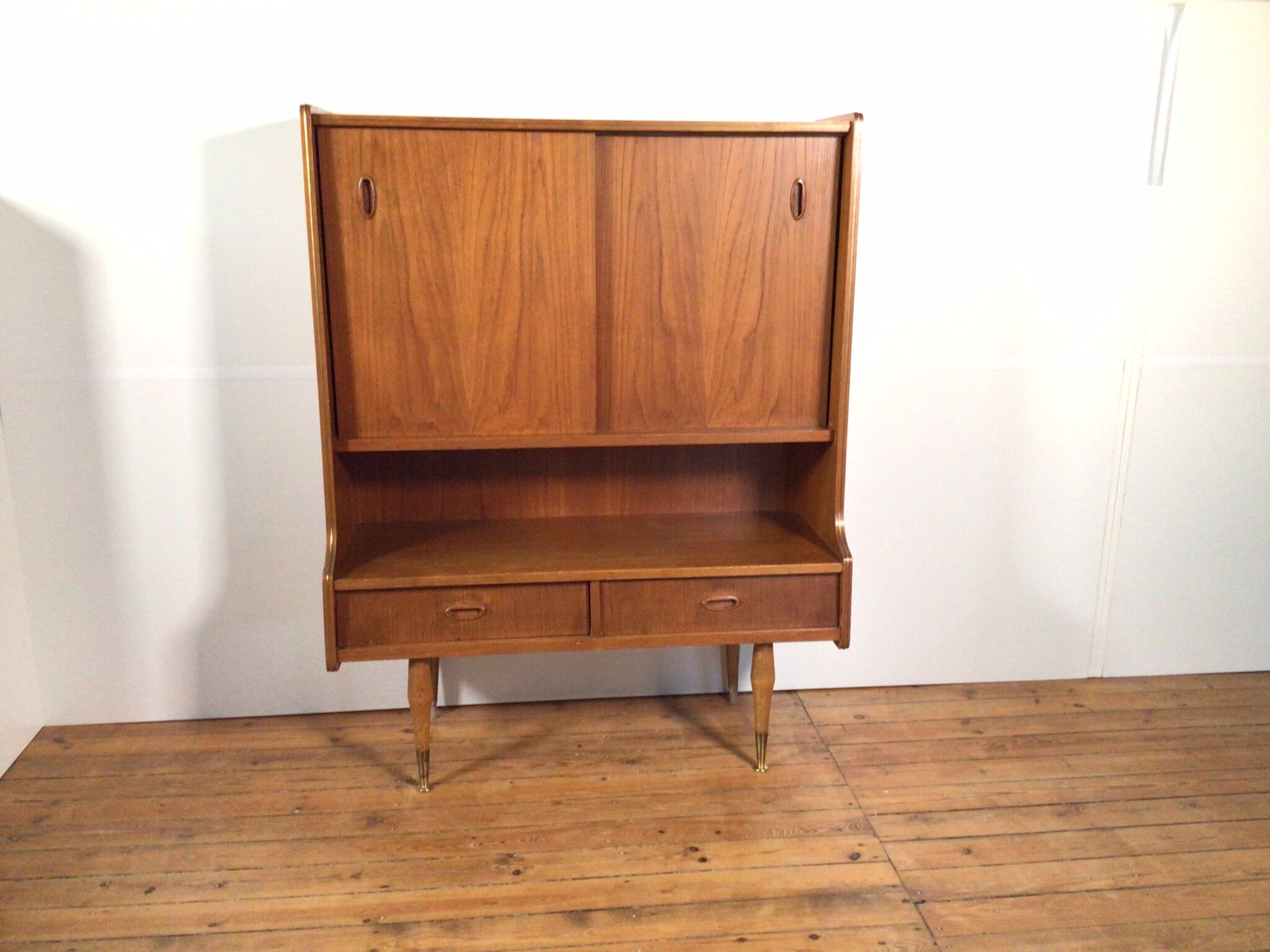 vintage sideboard with drawers and sliding doors