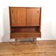 vintage sideboard with drawers and sliding doors