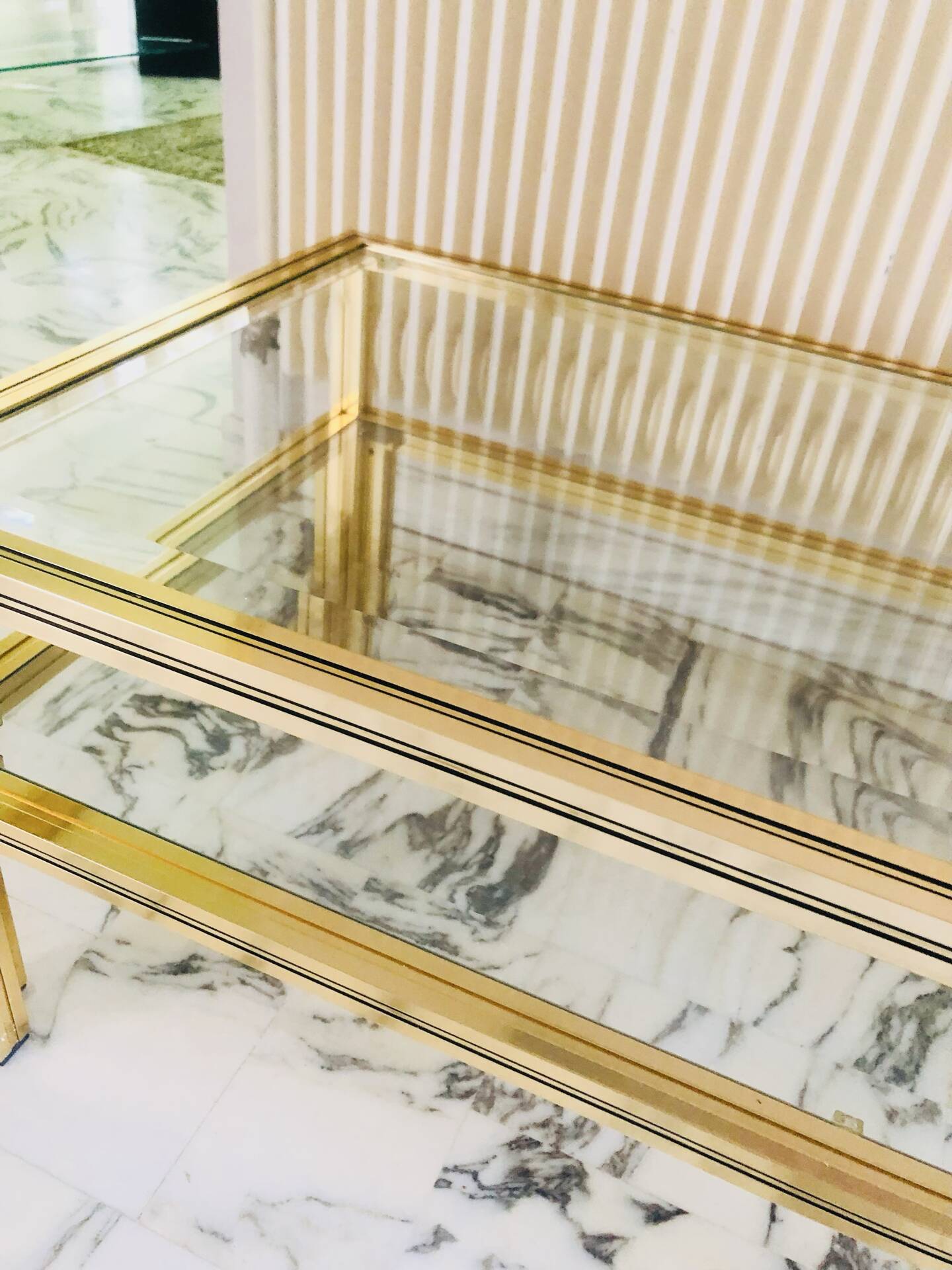 Coffee table with 2 brass and glass tops signed Pierre Vandel Paris, circa 70s.