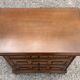 Vintage bedside cabinet with three drawers in moulded wood, Louis XV style.