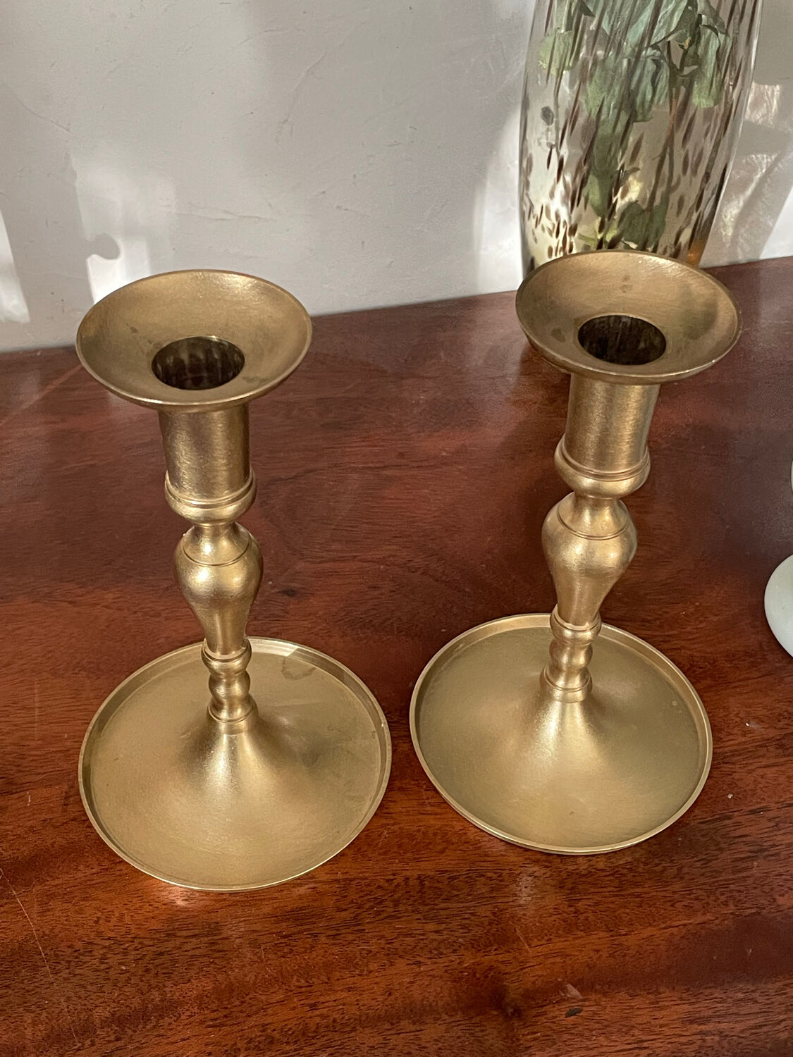 Pair of brushed brass candle holders