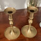 Pair of brushed brass candle holders