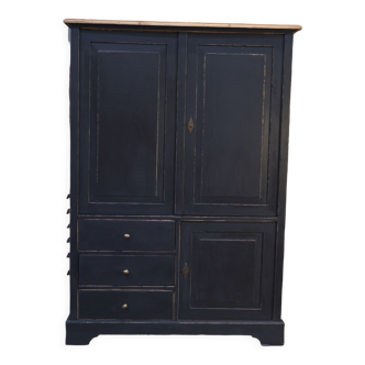 Fir cabinet with reentrant doors and drawers