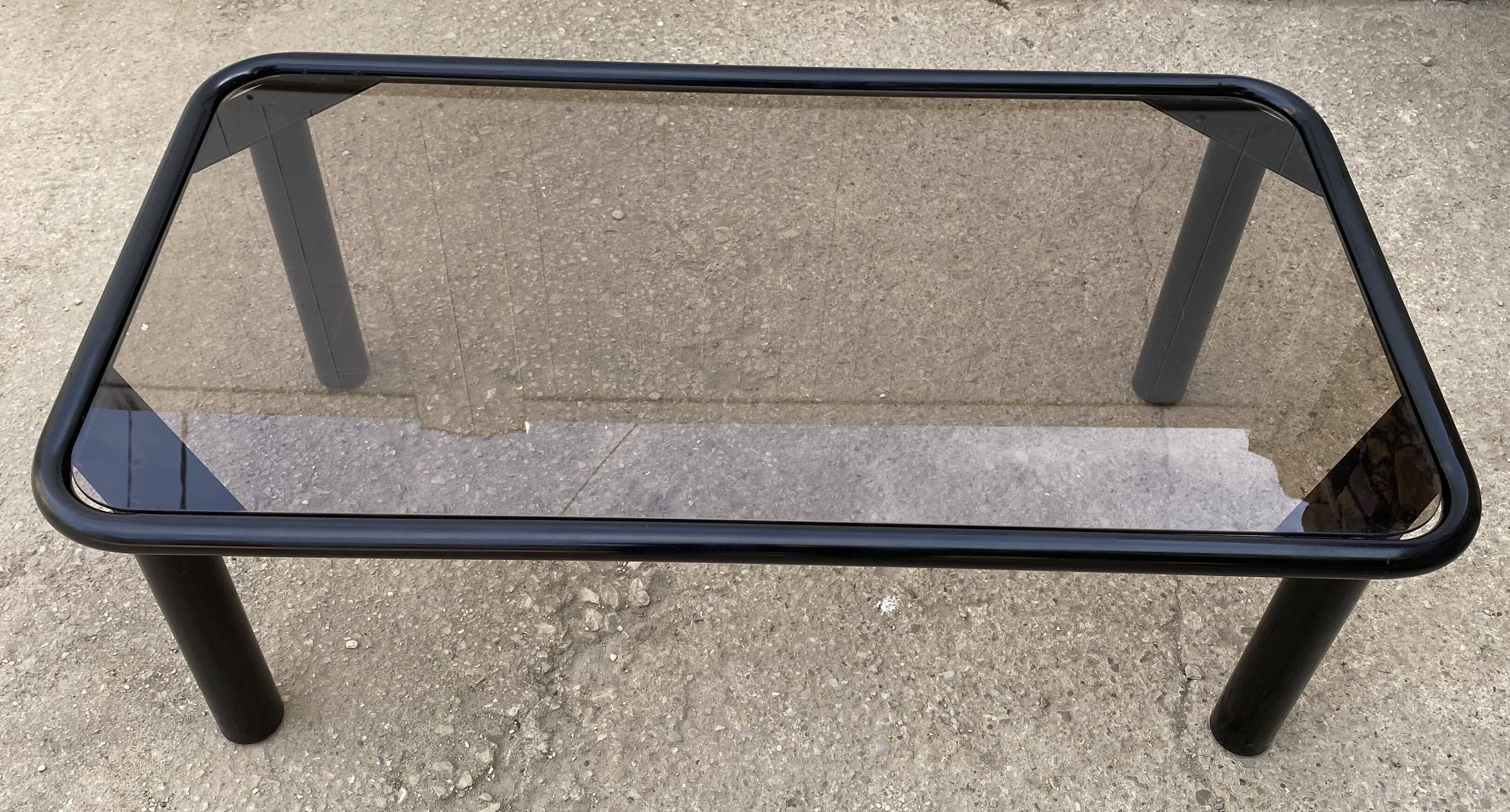 Black tubular coffee table with smoked glass by Yves Boutboul, 1980.