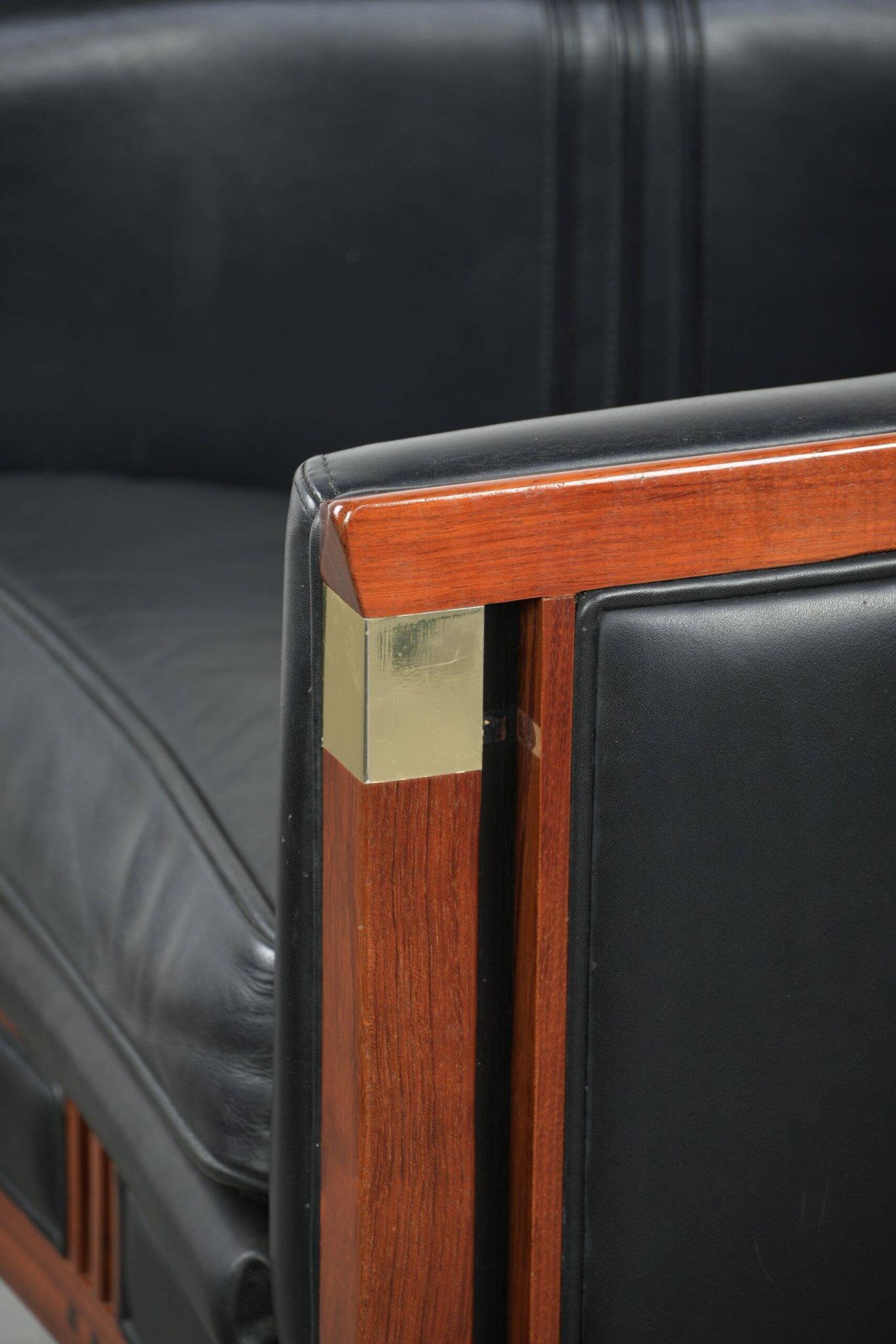 Black leather and wooden Art Deco design armchair