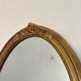 Oval mirror in carved wood