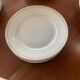 Lot of six flat plates, crockery, old white, gilded