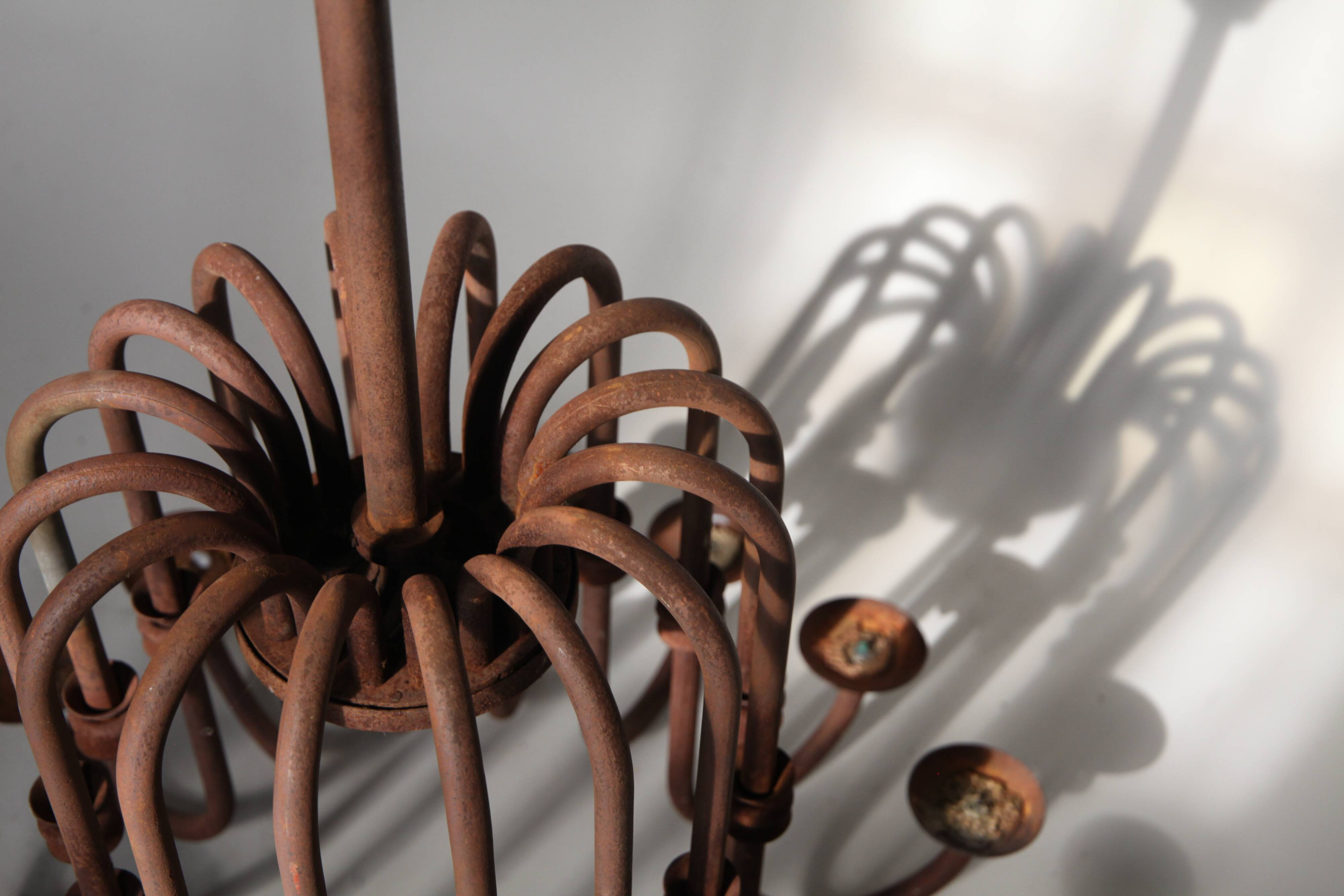 Large antique chandelier with 16 light arms