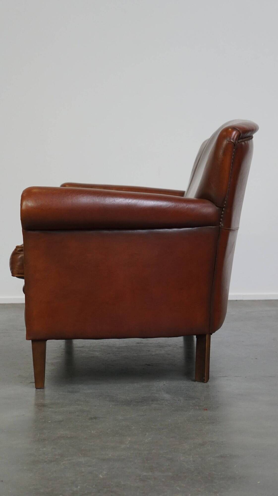 Classic 2 seater sheepskin sofa with beautiful colours and good seating comfort