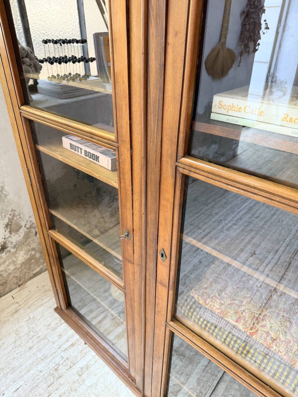 Glass-fronted walnut library 1900