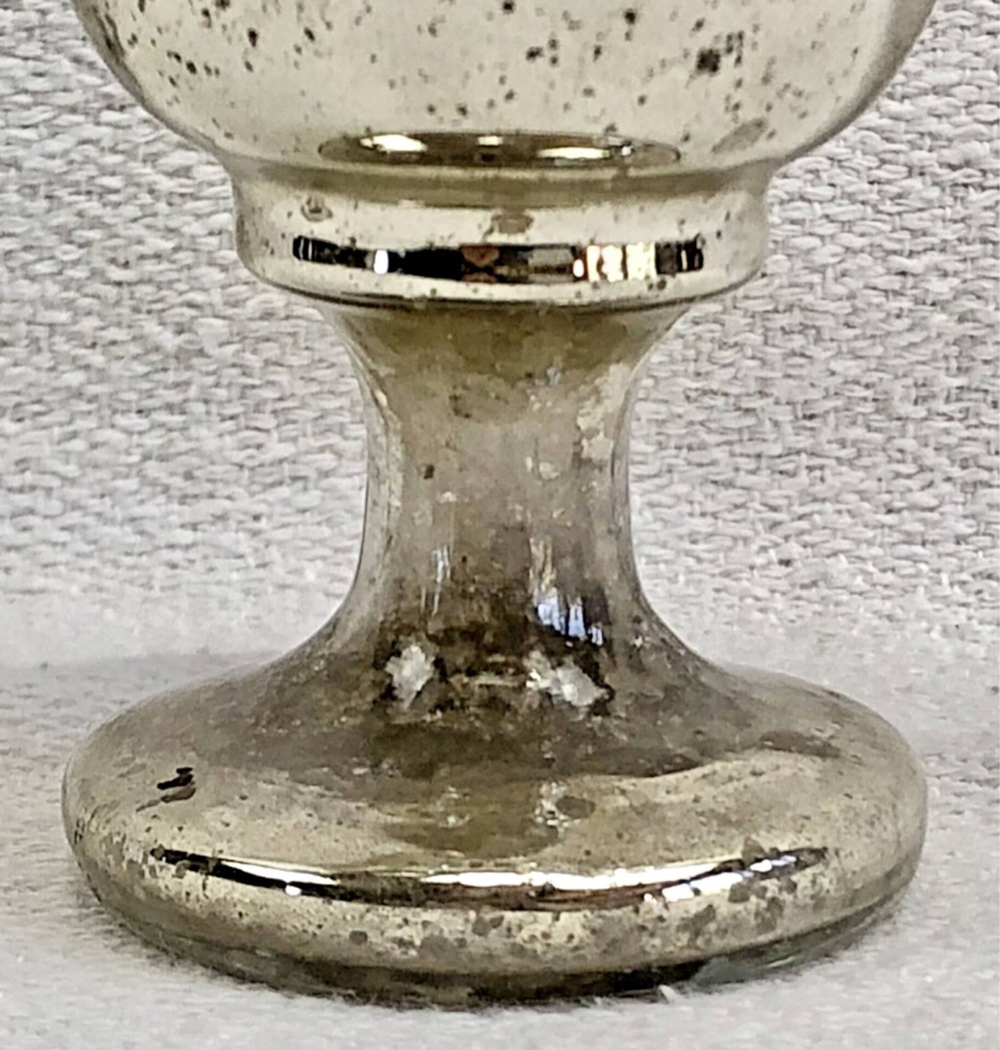 Painted blown glass egg cup with mercury gilding, 19th century.