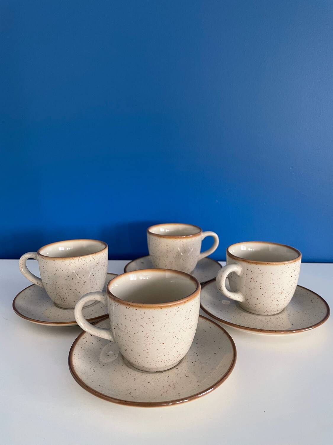 Speckled beige cup and saucer coffee set