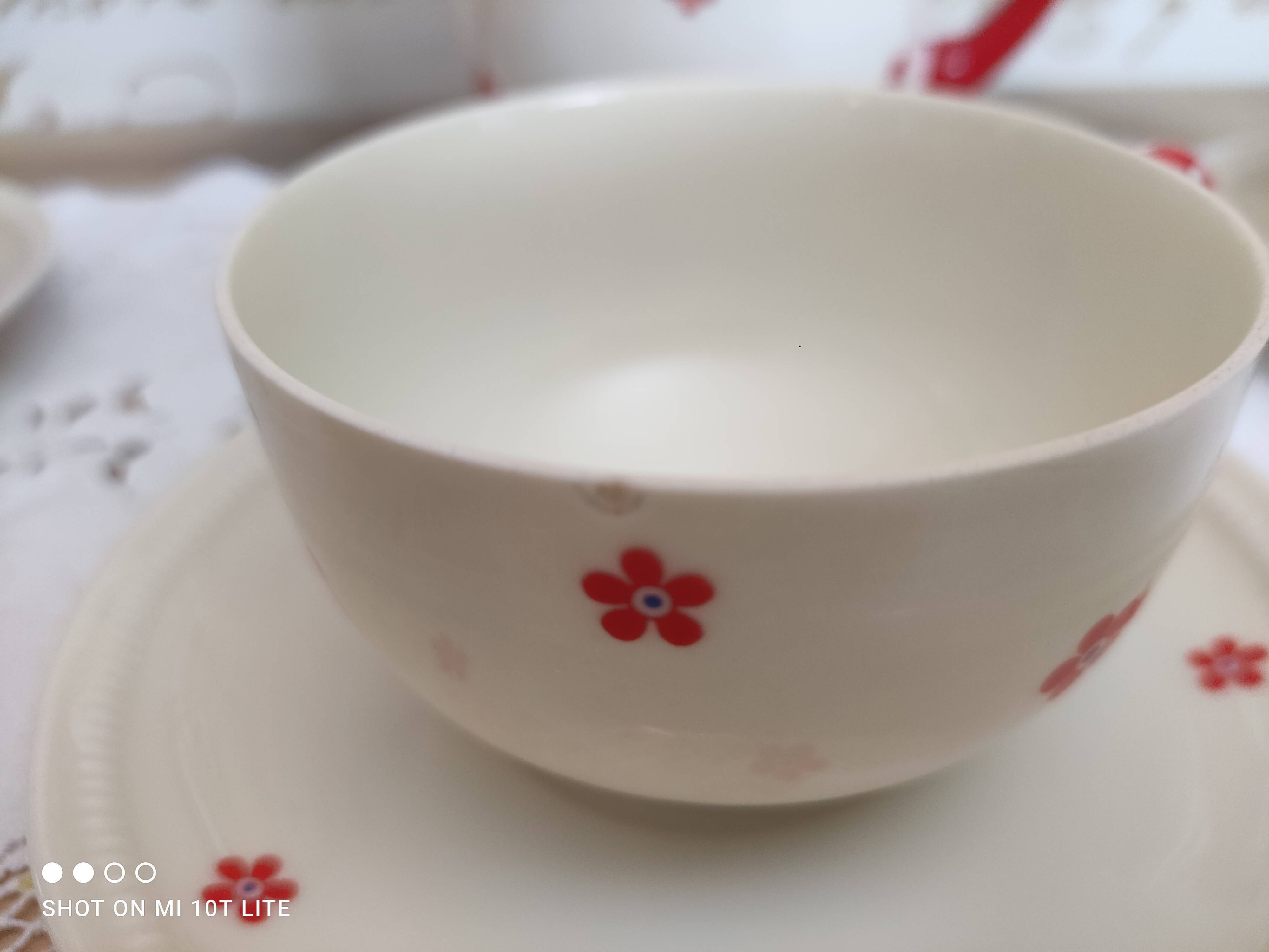 Service à café ou à thé 11 pièces en porcelaine Bavaria beige et petites fleurs oranges