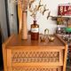 Vintage 1960s chest of drawers / chiffonnier with tapered legs and rattan.